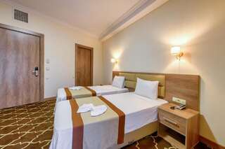 Отель Gallery Inn Тбилиси Стандартный двухместный номер с 2 отдельными кроватями-1